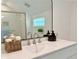 Bathroom featuring a large mirror, a sink, and modern vanity with white countertops at 2437 N Decatur Rd, Decatur, GA 30033