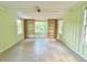 Bright living room featuring open shelving and windows with natural light at 2437 N Decatur Rd, Decatur, GA 30033