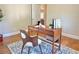 Cozy home office featuring a modern desk and chair with a stylish area rug at 2437 N Decatur Rd, Decatur, GA 30033