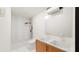Modern bathroom design showcasing double sinks, sleek fixtures, and a minimalist shower area at 458 Shannon Sw Dr, Atlanta, GA 30310