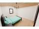 Cozy bedroom with hardwood floors, a modern bed, and natural light from a window at 458 Shannon Sw Dr, Atlanta, GA 30310