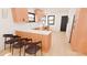 Bright, modern kitchen with light wood cabinets, white countertops, and stainless steel appliances at 458 Shannon Sw Dr, Atlanta, GA 30310