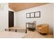 Cozy sitting area with vaulted ceiling, modern chair, and stylish decor at 458 Shannon Sw Dr, Atlanta, GA 30310