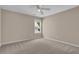 Bright bedroom featuring neutral walls and a window with lots of natural light at 5040 Stonehaven Vw, Cumming, GA 30040