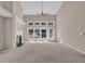 Bright living room with soaring ceilings, gas fireplace, lots of natural light and neutral decor at 5040 Stonehaven Vw, Cumming, GA 30040