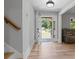 Bright entryway with hardwood floors, open to the living spaces at 919 Rock Oak Ln, Lawrenceville, GA 30046