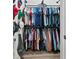 Large walk-in closet with custom shelving, hanging rods, and organizational accessories at 112 Rogers Street Ne # 410, Atlanta, GA 30317