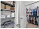 Walk-in closet with custom shelving and ample space for clothing and accessories at 112 Rogers Street Ne # 410, Atlanta, GA 30317