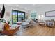 Cozy living area with a comfortable seating, balcony access and workspace at 112 Rogers Street Ne # 410, Atlanta, GA 30317