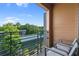 Relaxing balcony with peaceful views of surrounding trees at 112 Rogers Street Northeast Ne St # 410, Atlanta, GA 30317