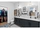 Stylish bathroom with double vanity, walk-in closet and unique decorative touches at 112 Rogers Street Northeast Ne St # 410, Atlanta, GA 30317