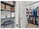 Organized walk-in closet with shelving and ample storage for clothes and accessories at 112 Rogers Street Northeast Ne St # 410, Atlanta, GA 30317