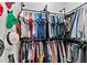 Well-arranged closet space with hanging racks and organized clothing at 112 Rogers Street Northeast Ne St # 410, Atlanta, GA 30317