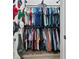 Spacious walk-in closet featuring extensive hanging racks and organized storage solutions at 112 Rogers Street Northeast Ne St # 410, Atlanta, GA 30317