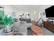 Open-concept living space with modern furnishings and abundant natural light at 112 Rogers Street Northeast Ne St # 410, Atlanta, GA 30317