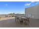 Spacious rooftop patio with dining table, grill, and comfortable seating areas, perfect for entertaining at 112 Rogers Street Northeast Ne St # 410, Atlanta, GA 30317