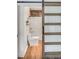 Bathroom features sliding door, modern fixtures, and wood-look flooring at 2572 Bates Se St, Smyrna, GA 30080
