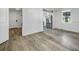 Open-concept living room showcases stylish wood flooring and modern trim, creating a bright and inviting space at 2572 Bates Se St, Smyrna, GA 30080