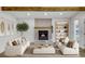 Inviting living room with a cozy fireplace, stylish decor, and ample seating for relaxing at 2572 Bates Se St, Smyrna, GA 30080