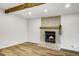 Living room with a cozy fireplace and hardwood floors at 2572 Bates Se St, Smyrna, GA 30080