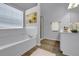 Bright bathroom featuring a tub, shower, and vanity with modern fixtures at 2988 Belfaire Lake Dr, Dacula, GA 30019
