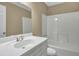 This bathroom features a single sink vanity and tub with a shower at 2988 Belfaire Lake Dr, Dacula, GA 30019
