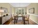 Formal dining room is ideal for hosting dinner parties and features views of the front yard at 2988 Belfaire Lake Dr, Dacula, GA 30019
