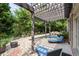 Backyard patio with a pergola, a swimming pool, and surrounding greenery for privacy at 3519 Preserve Se Dr, Atlanta, GA 30339