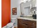 Stylish half bathroom showcasing a vessel sink, granite countertop, wooden vanity, and designer color choices at 3519 Preserve Se Dr, Atlanta, GA 30339
