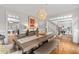 Open dining area showcasing hardwood floors, decorative lighting, and seamless access to other living spaces at 3519 Preserve Se Dr, Atlanta, GA 30339