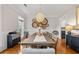 Elegant dining room with hardwood floors, decorative lighting, and ample seating for gatherings at 3519 Preserve Se Dr, Atlanta, GA 30339
