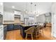 Modern kitchen with white cabinets, center island, stainless steel appliances, and breakfast bar at 3519 Preserve Se Dr, Atlanta, GA 30339