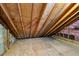 Spacious unfinished attic with plywood flooring and exposed beams and insulation at 51 Ivy Chase Ne, Atlanta, GA 30342
