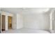 A light filled bedroom with plush carpet, ceiling fan, window with shutters and two doorways at 51 Ivy Chase Ne, Atlanta, GA 30342