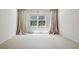 Bright and airy room with large windows and draperies for natural light at 51 Ivy Chase Ne, Atlanta, GA 30342