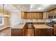 Spacious kitchen featuring granite countertops, stainless steel appliances, and ample cabinet space at 51 Ivy Chase Ne, Atlanta, GA 30342