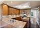 Well-appointed kitchen with granite countertops, stainless steel appliances, and custom wood cabinetry at 51 Ivy Chase Ne, Atlanta, GA 30342