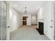 Light filled room with plush carpet, fireplace and access to outside patio at 51 Ivy Chase Ne, Atlanta, GA 30342