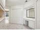 Bright main bathroom featuring a vanity area, closet, and access to the shower and tub at 51 Ivy Chase Ne, Atlanta, GA 30342