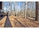 Expansive backyard with mature trees at 7994 Devonshire Dr, Jonesboro, GA 30238