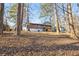 Backyard view of home at 7994 Devonshire Dr, Jonesboro, GA 30238