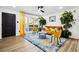 Bright living room with large window, contemporary furnishings, and stylish decor at 7994 Devonshire Dr, Jonesboro, GA 30238