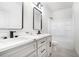 Modern bathroom featuring double sinks, a new vanity, and shower at 110 Northwood Creek Way, Oxford, GA 30054