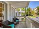 Private balcony with seating overlooking a parking area and trees at 1450 Keys Crossing Ne Dr, Brookhaven, GA 30319
