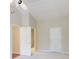 Neutral bedroom with ceiling fan, with a view to another area of the home at 1450 Keys Crossing Ne Dr, Brookhaven, GA 30319