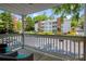 Cozy patio with seating area offers views of lush greenery and building exterior at 1450 Keys Crossing Ne Dr, Brookhaven, GA 30319