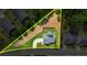 A top-down view showing property lines, the home's roof, the driveway, and surrounding neighborhood at 200 Cherokee Reserve Cir, Canton, GA 30115