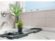 Bright bathroom with a decorative plant and sleek bath caddy for a spa-like experience at 200 Cherokee Reserve Cir, Canton, GA 30115