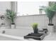 Relaxing bathtub featuring plants and a wooden tray on top of the bath at 200 Cherokee Reserve Cir, Canton, GA 30115