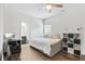 Cozy bedroom with hardwood floors offers modern ceiling fan and comfortable daybed at 200 Cherokee Reserve Cir, Canton, GA 30115